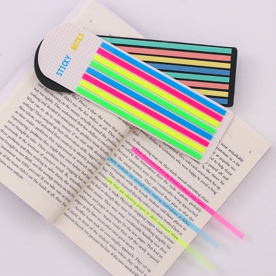 Highlighter Tape - visat hur de ser ut i en bok.